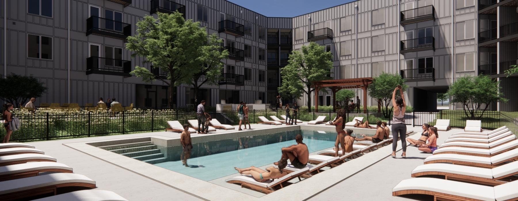 a group of people in a swimming pool in front of a building